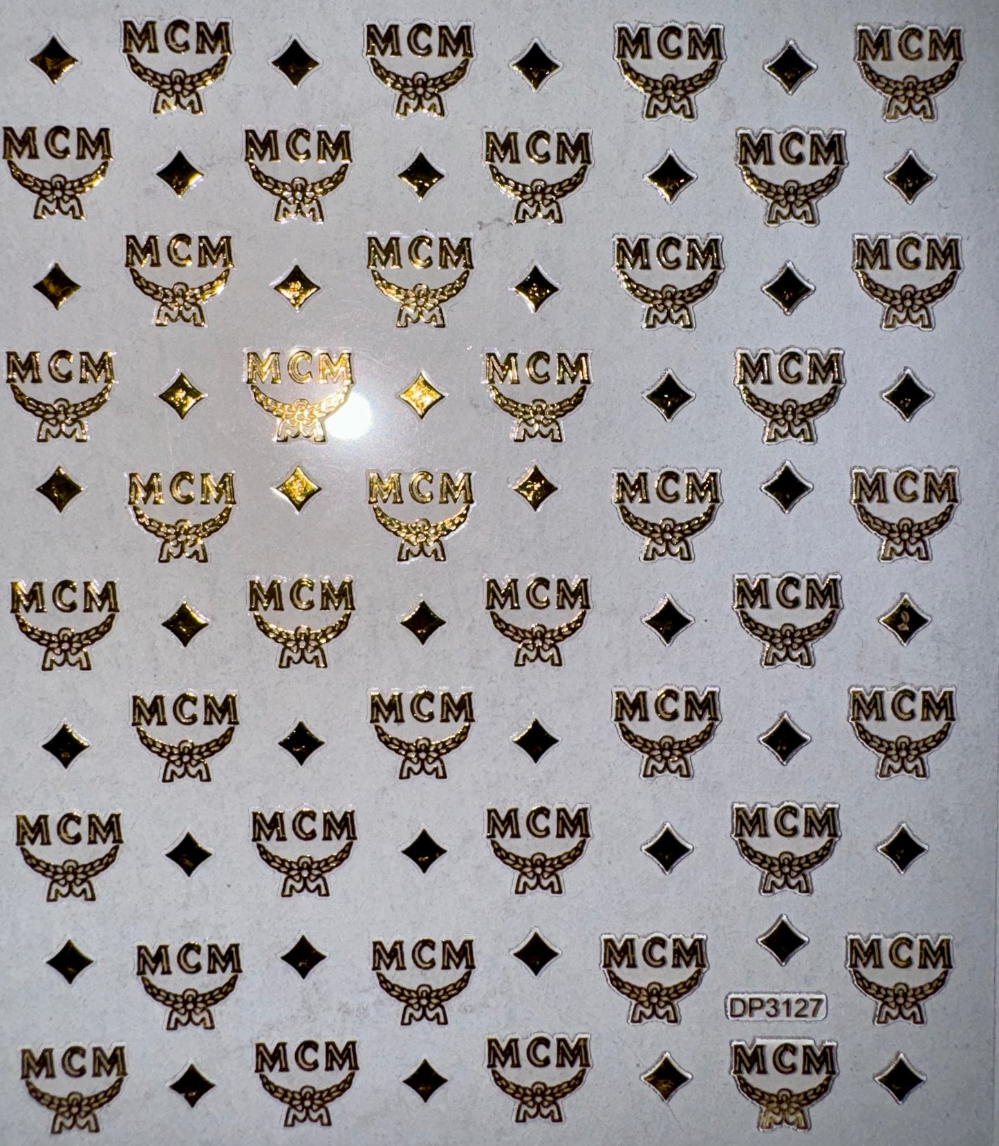 DESIGNER STICKER - MCM